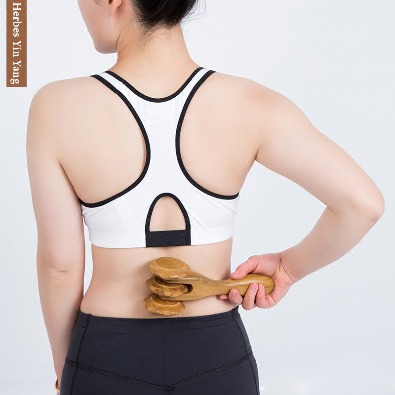 Utilisation du rouleau de massage sur les lombaires Rouleau sur le bas du dos